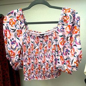 Boutique top size medium but fits like a small